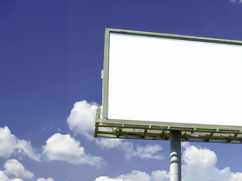 Billboard blank with blue sky for advertisement spring sunny day