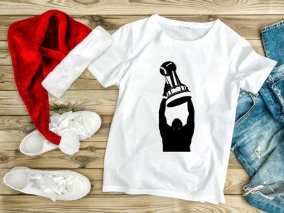 A person holding up a trophy in triumph and celebration