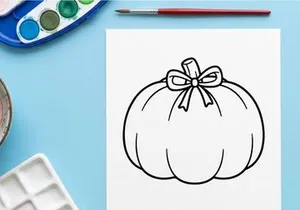 Hand-drawn Halloween gift bag with ribbon bow. Spooky party favor sack for treats and decorations.