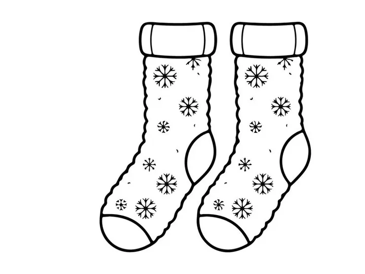 Pair of festive Christmas socks with snowflakes and ribbons for holiday celebrations