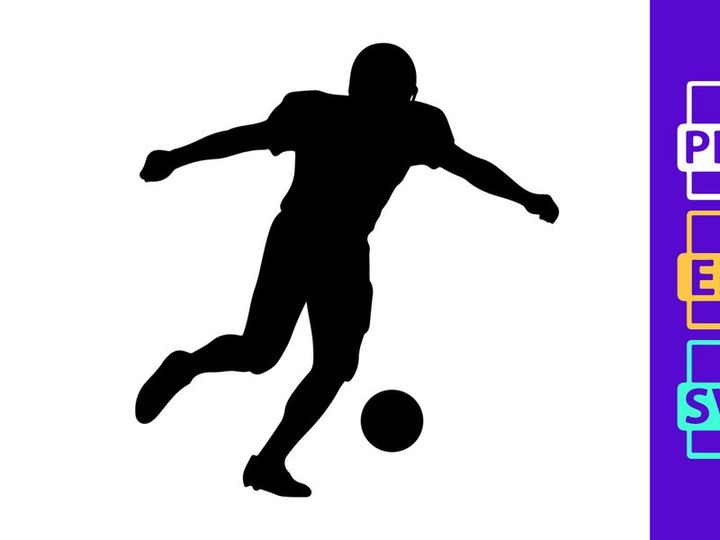 Silhouette of a soccer player kicking a ball in mid action