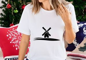 Windmill on rolling hills silhouette