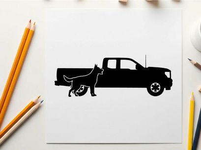 Silhouette of a dog standing beside a pickup truck