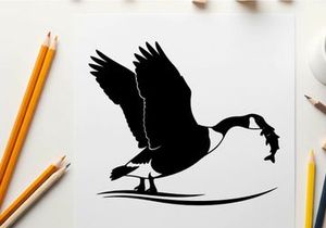 Silhouette of a bird catching a fish in mid air