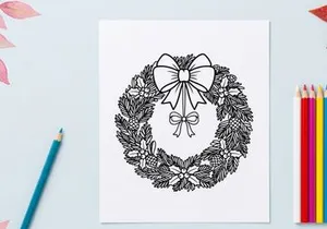 Christmas wreath line art illustration with pine cones and a decorative festive bow