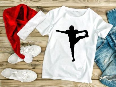 Silhouette of a person performing a yoga or dance pose