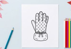 Hand-drawn white Christmas mitten with polka dots and bow gift accessory illustration