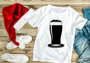 Dark beer in a pint glass with foam