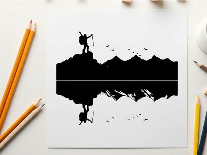 Silhouette of a hiker on a mountain peak at sunrise