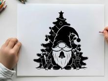 Christmas gnome silhouette with tree and stockings
