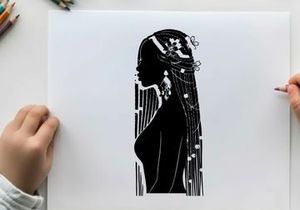 Silhouette of a woman with long hair and ornaments