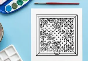 Christmas window decoration with festive holly leaf pattern and polka dot design.