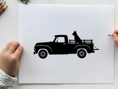 Silhouette of a dog in the back of a vintage pickup truck