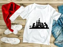 Kids Building Sandcastle on Beach