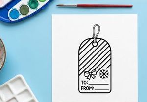 Schwarz-weißes Geschenkanhänger mit Schleife und Schneeflocken-Illustration