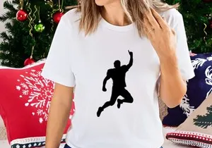 A silhouette of a person jumping up in the air with one arm raised high