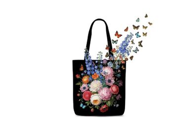 Vibrant floral silhouette design on black tote bag with butterflies preview picture