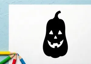 Silhouette of a Halloween Jack-o'-Lantern with a spooky face