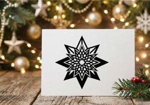 Black and white geometric star ornament isolated on a white background