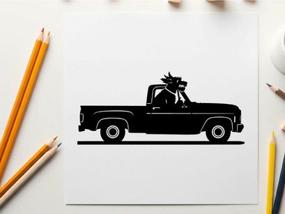 Silhouette of a dragon riding in a pickup truck