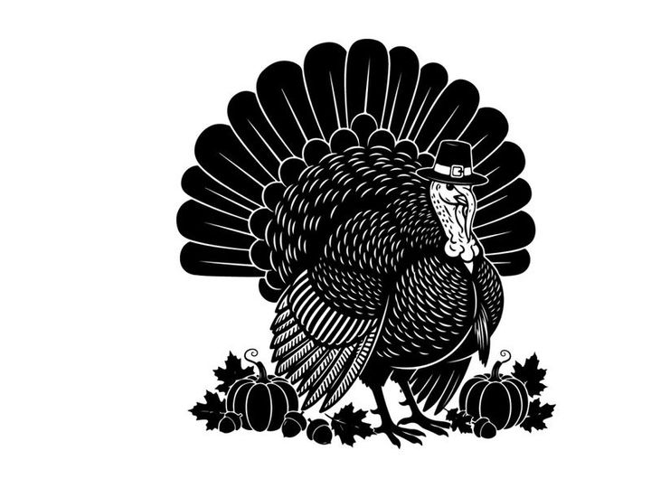 Black and white silhouette of a turkey with pumpkins and leaves