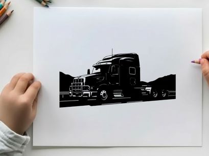 Silhouette of a large truck driving on a highway with mountains