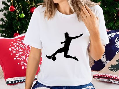 Soccer player kicking a ball in mid air with dynamic movement and energy