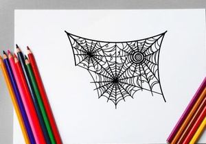 Intricate spider web with dew drops and spiral pattern for Halloween decor