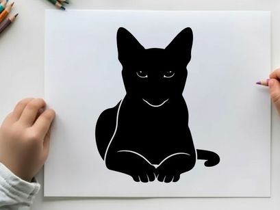 Black silhouette of a cat sitting down looking forward