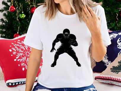 American football player in action running with ball