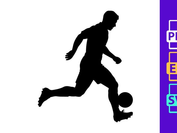 Silhouette of a soccer player kicking a ball in motion