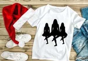 Three women dancing in silhouette black and white party style
