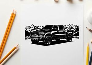 Silhouette of a pickup truck in front of mountains