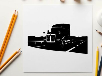 Silhouette of a semi truck driving on a highway with mountains