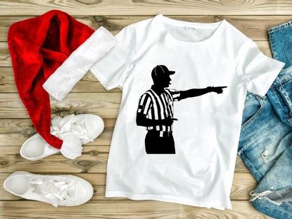 A black silhouette of a referee pointing to the right in a striped shirt