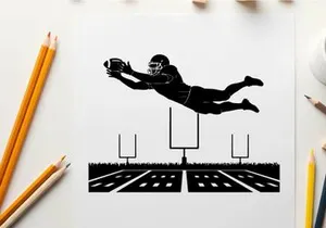 American football player in mid air silhouette catching a ball