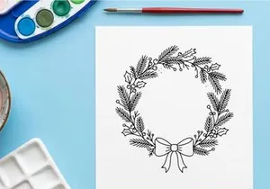 Hand drawn Christmas wreath with pine branches and bow isolated on white background