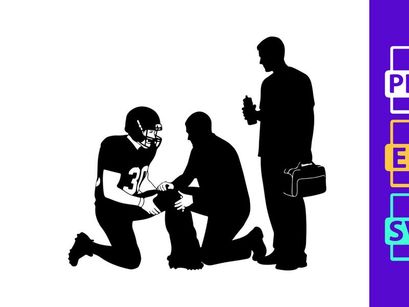 American football player receiving medical attention on the field from trainer