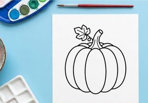Abóbora com folha, decoração de Halloween. Símbolo de colheita de outono para comemorações sazonais.