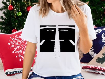 A black and white image of a road with white markings and numbers