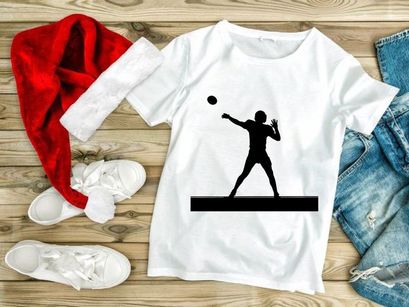 American football player catching a ball in mid air