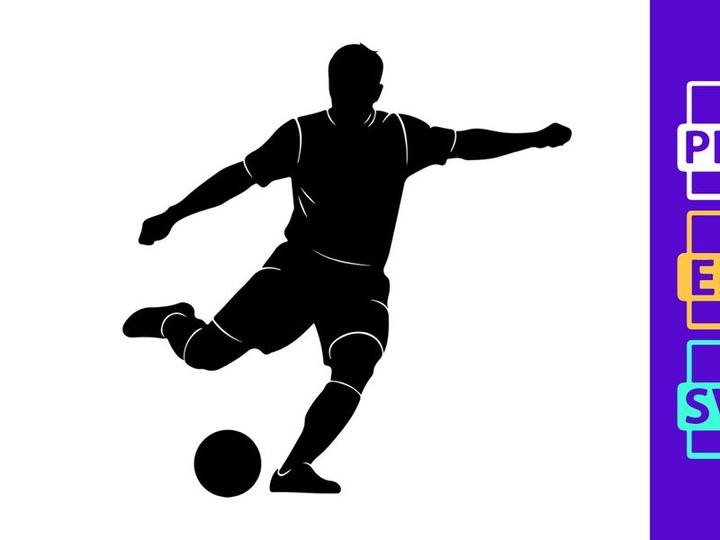 Silhouette of a soccer player kicking a ball in mid action