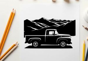 Vintage truck silhouette against majestic mountain range