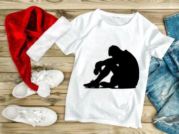 A person sitting alone in a state of sadness or despair on the floor preview picture