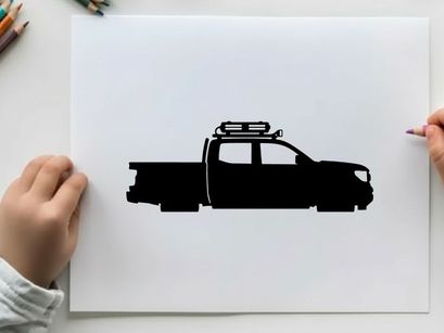 Silhouette of a pickup truck with roof rack