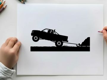 Silhouette of a pickup truck towing a trailer up a steep incline preview picture