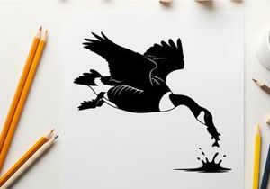 Silhouette of a canada goose in flight diving into water silhouette