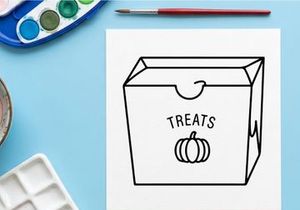 Halloween candy gift box with pumpkin and ghost treats. Spooky party favor container for trick-or-treat handouts and celebrations.