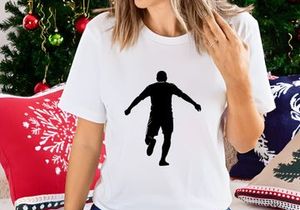 A silhouette of a man running with arms outstretched in a dynamic pose