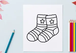 Pair of cartoon Christmas socks with stars for festive holiday gift or celebration